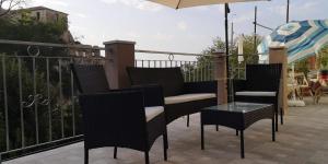 A balcony or terrace at La Casa di Sara
