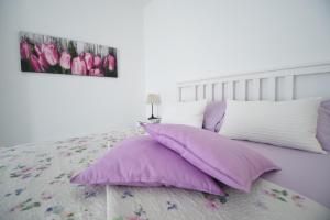 Una cama o camas en una habitación de Blue sea apartment