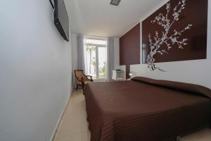 Posteľ alebo postele v izbe v ubytovaní Sol Playa