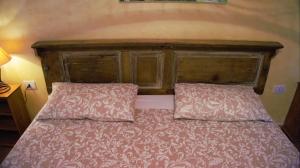 Postel nebo postele na pokoji v ubytování B&B Donna Maja