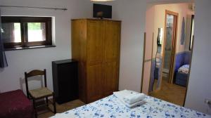 Postel nebo postele na pokoji v ubytování B&B Donna Maja