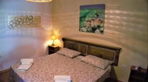 Postel nebo postele na pokoji v ubytování B&B Donna Maja