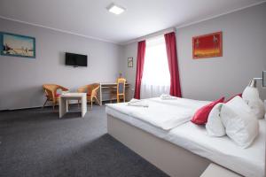 Postel nebo postele na pokoji v ubytování Hotel Stella