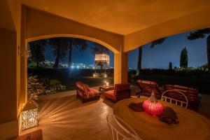 Posezení v ubytování Tra gli Alberi e il Mare + 37 fotografií
