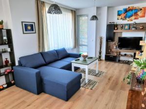 TV a/nebo společenská místnost v ubytování NC Apartment Ruse