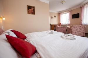 Postel nebo postele na pokoji v ubytování Hotel Stella