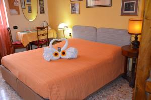 Postel nebo postele na pokoji v ubytování B&B Villa Olmo