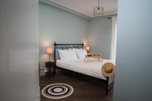 A bed or beds in a room at The Loft
