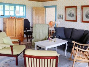 Posezení v ubytování 6 person holiday home in Slöinge