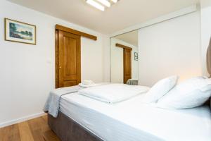 Łóżko lub łóżka w pokoju w obiekcie Holiday house DREAM