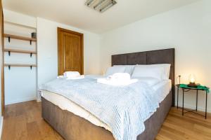Łóżko lub łóżka w pokoju w obiekcie Holiday house DREAM