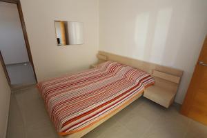 Posteľ alebo postele v izbe v ubytovaní Apartamento playa maravillosa 2 + 20 fotografií