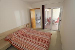 Posteľ alebo postele v izbe v ubytovaní Apartamento playa maravillosa 2