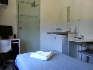 Postel nebo postele na pokoji v ubytování Central Private Hotel