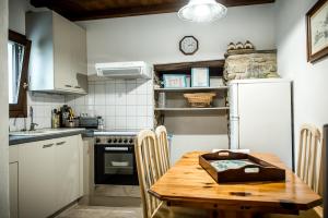 Kuchyň nebo kuchyňský kout v ubytování Nostro Rifugio