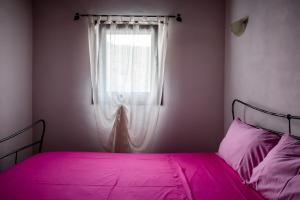 Postel nebo postele na pokoji v ubytování Nostro Rifugio