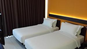 Voodi või voodid majutusasutuse V Hotel Tebet toas