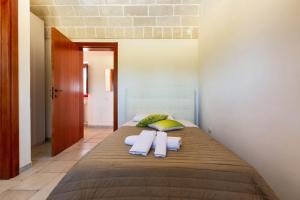 Posteľ alebo postele v izbe v ubytovaní Villa Ajeni by Perle di Puglia