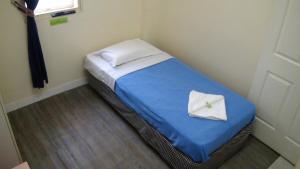 Postel nebo postele na pokoji v ubytování Central Private Hotel