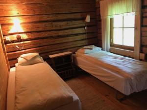 Postel nebo postele na pokoji v ubytování Vango Holiday Village