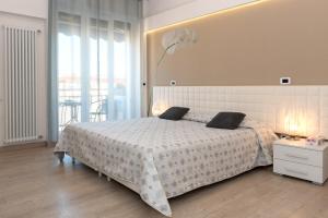 Cama ou camas em um quarto em Rosella Apartment