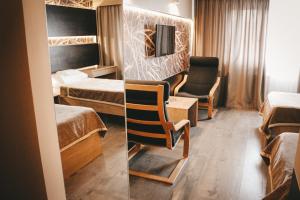 Postel nebo postele na pokoji v ubytování Hotel Druzhba