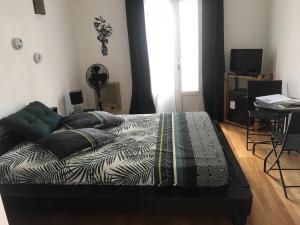 Voodi või voodid majutusasutuse Chambre en Ardèche du Sud toas
