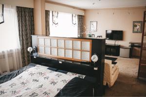 Postel nebo postele na pokoji v ubytování Hotel Druzhba