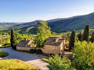 an aerial view of a house in the mountains at Il Castello in Bucine
