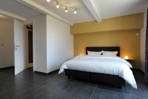 Letto o letti in una camera di B&B Back2Front