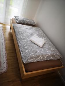 two bunk beds in a room with a mattress at LUXURY Apartment near fair and central City in few min, with garden in Frankfurt/Main