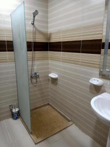 Ένα μπάνιο στο Jewel Mandara Apartments