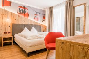 Posteľ alebo postele v izbe v ubytovaní Hotel Astoria
