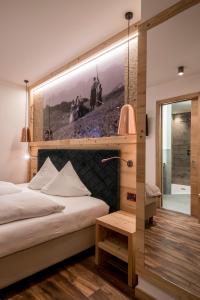 Posteľ alebo postele v izbe v ubytovaní Hotel Astoria