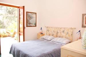 Posteľ alebo postele v izbe v ubytovaní Casa Celidea