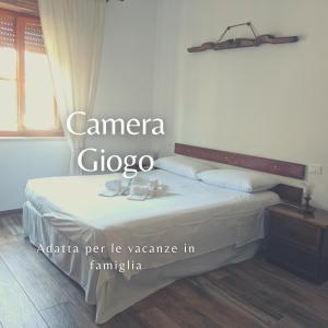 Postel nebo postele na pokoji v ubytování Maremmano BnB