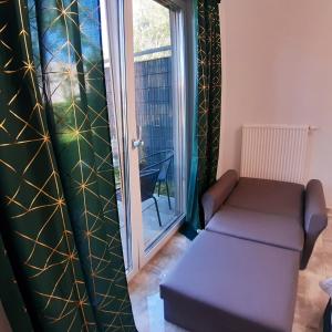 Posezení v ubytování Na Grobli 20 Apartament z ogródkiem