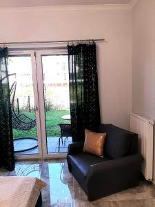Posezení v ubytování Na Grobli 20 Apartament z ogródkiem