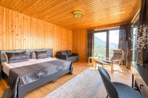 Кровать или кровати в номере Avena Mountain Hotel - Adults Only