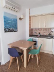 Kuchyň nebo kuchyňský kout v ubytování Apartamentos Orvay