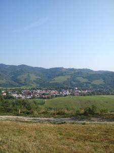 a view of a small town in the hills at Ubytovanie u Tomku in Rejdová