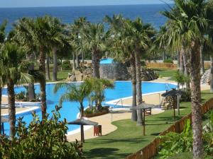 The swimming pool at or close to Apartamento Jardines