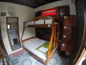 Postel nebo postele na pokoji v ubytování Esperanto Bed & Breakfast Surf Hostel