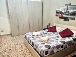 Postel nebo postele na pokoji v ubytování Il Secondo Piano
