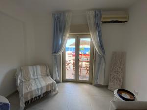 Postel nebo postele na pokoji v ubytování Casa Aletos Roccalumera-Taormina