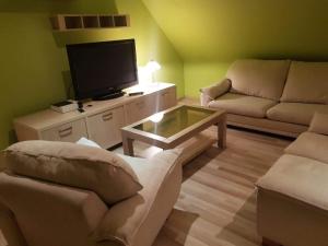 Χώρος καθιστικού στο Apartament U Kucharzy Łysica