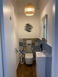 Koupelna v ubytování Casa Aletos Roccalumera-Taormina + 17 fotografií
