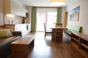 Küche/Küchenzeile in der Unterkunft Bergfink apartments