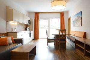 Küche/Küchenzeile in der Unterkunft Bergfink apartments