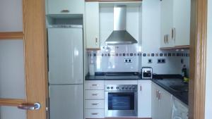 Kuchyňa alebo kuchynka v ubytovaní Apartamento playa Cambrils edificio Torresol